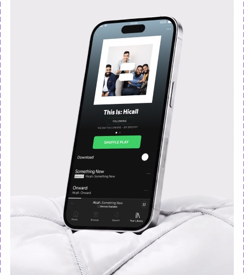 Phone on a white quilt showing the Hicall release This Is: Hicall